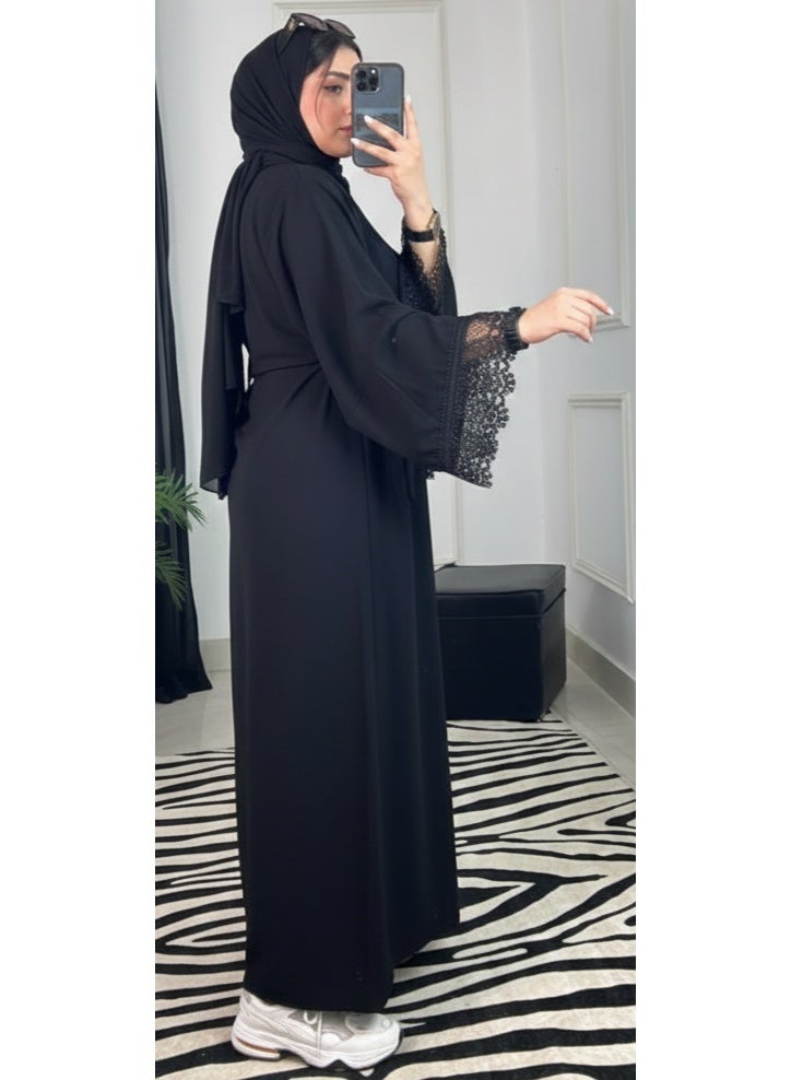 Elegant black women's abaya with luxurious lace sleeves, featuring a modern, wide design and sophisticated look perfect for special occasions and everyday outings. Add a touch of glamour and elegance to your look. Code 4040 - Image 3